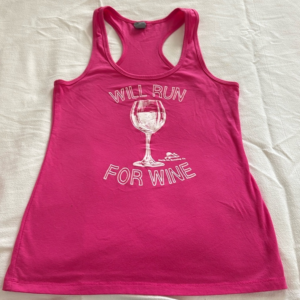 Cute running tank. Size large but fits more like a small.